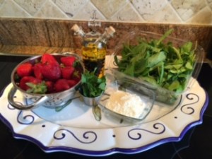 Ingredients for a strawberry & baby spinach salad