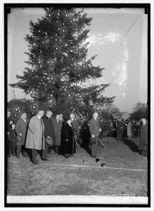Pres. Calvin Coolidge lights the first outdoor Christmas Tree on the White House Lawn