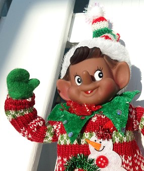 Christmas elf in a bad sweater