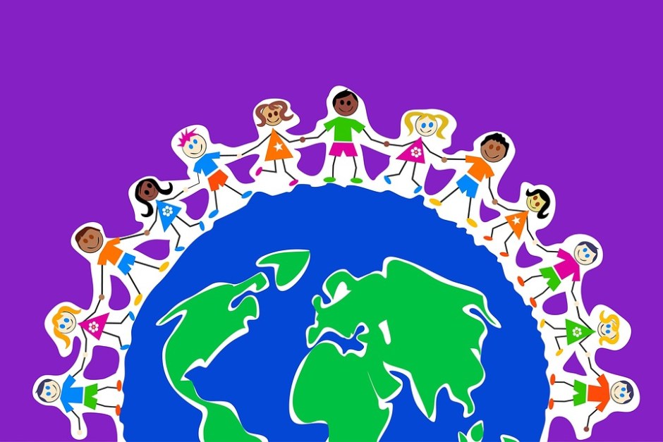 Colorful illustration of the globe surrounded by children of all nations holding hands