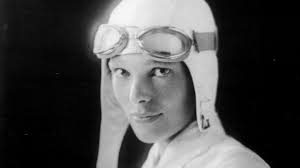 Amelia Earhart wearing flight cap
