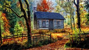 A log cabin in the autumn woods