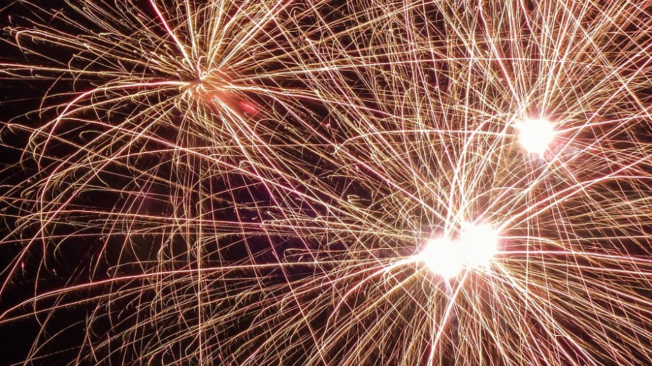 night sky with golden fireworks